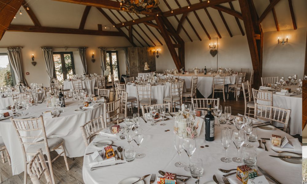 Elegant wedding banquet hall with rustic beams, ideal for events in Deer Park.