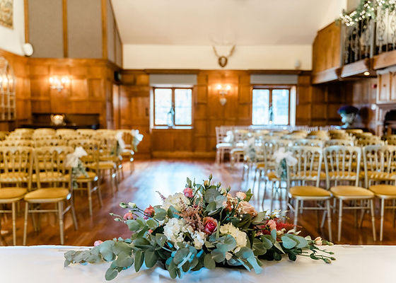 Elegant Panelled Hall with wooden paneling, ideal for weddings and formal events.
