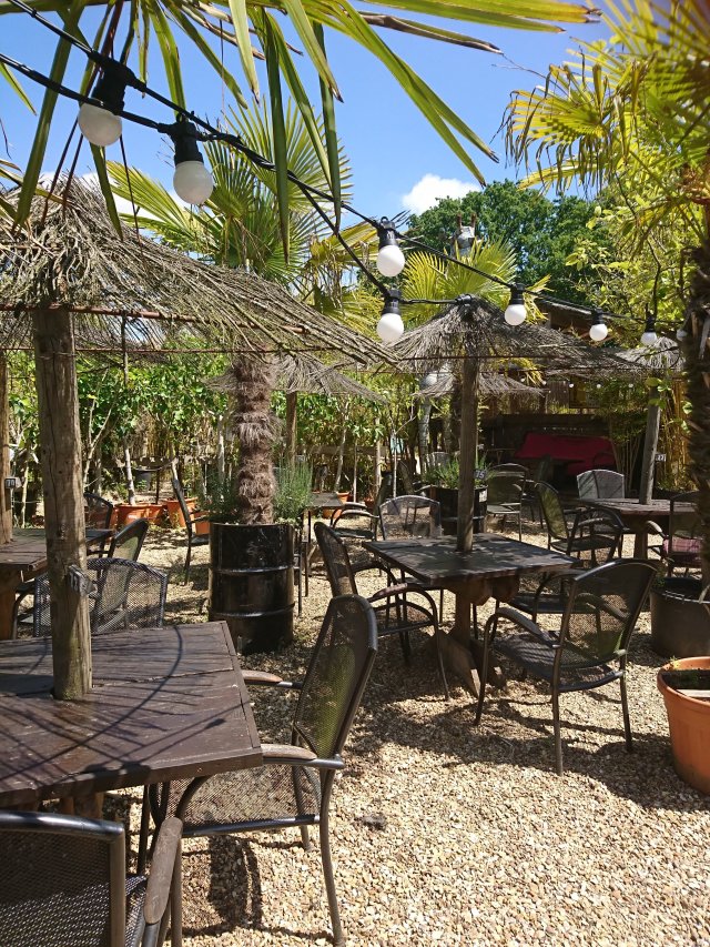 Outdoor restaurant at Akamba Venue with rustic decor, ideal for casual gatherings and events.