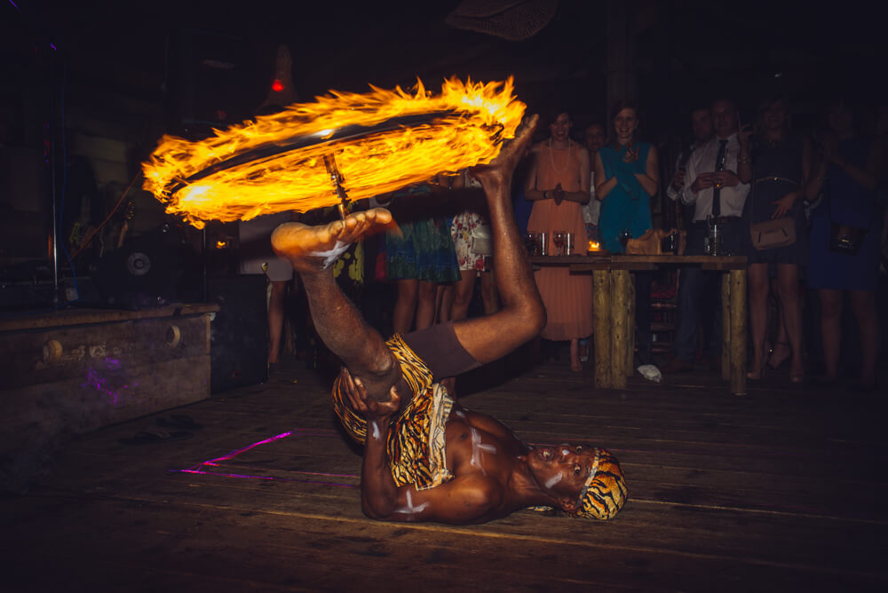 Fire dancer performance at Akamba Bar & Eatery, perfect for events and entertainment.