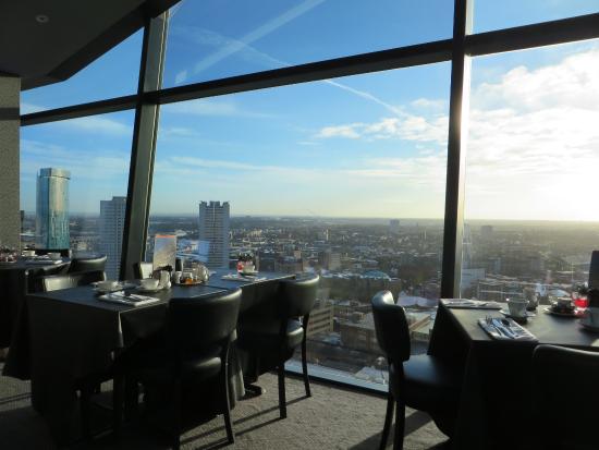 Sleek Restaurant in The Cube Hotel Birmingham with city skyline views, perfect for upscale events.