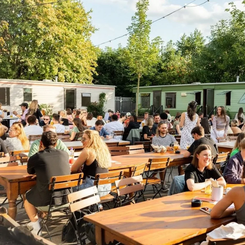 Caravans in Diecast: vibrant outdoor event space for social gatherings and team-building.