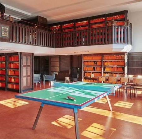 Versatile meeting space in Generator Amsterdam with ping pong table for team bonding.