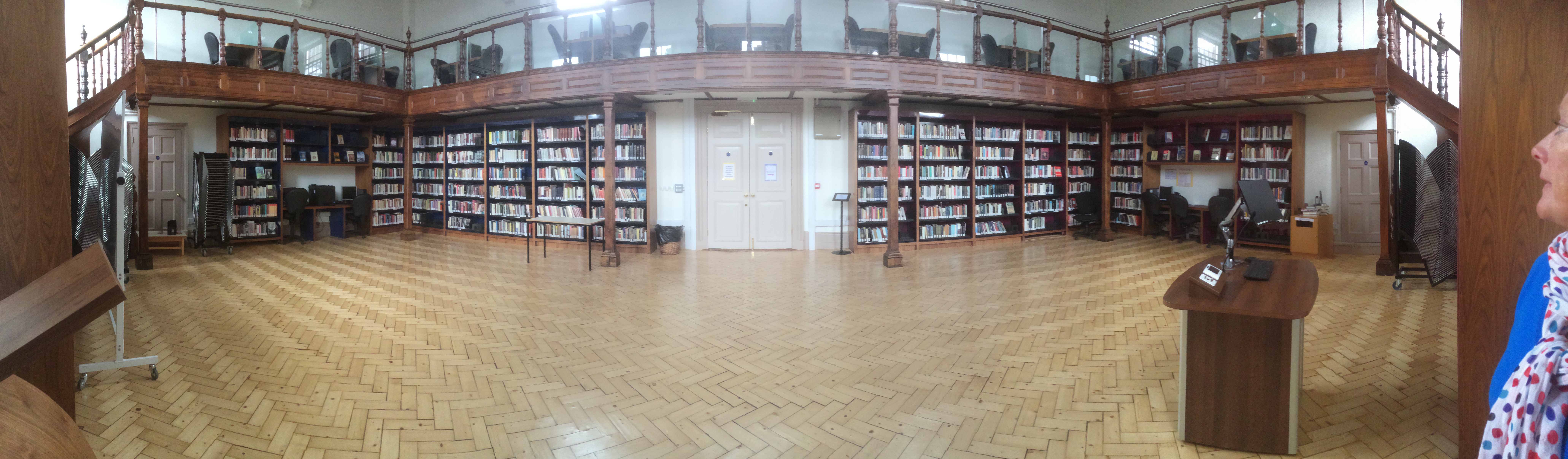 Garnett Room library at Marlborough College, featuring wooden shelves for events and workshops.