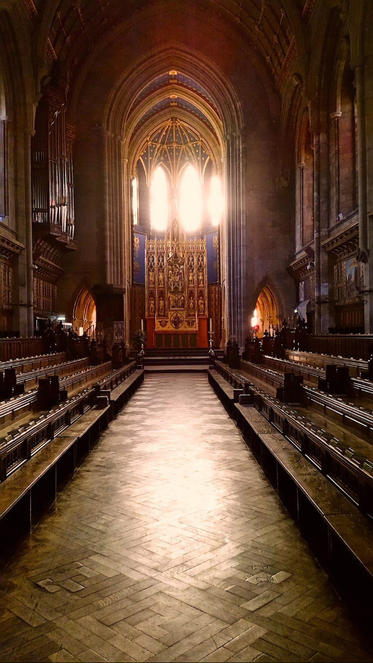 St Michael and All Angels Chapel interior with ornate altar, ideal for weddings and events.
