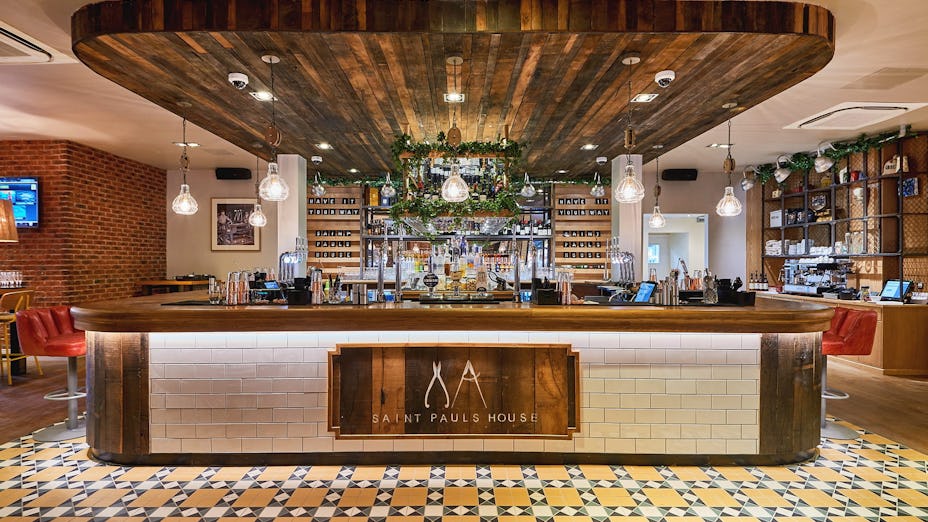 Stylish bar area in Saint Pauls House, perfect for networking events and cocktail receptions.