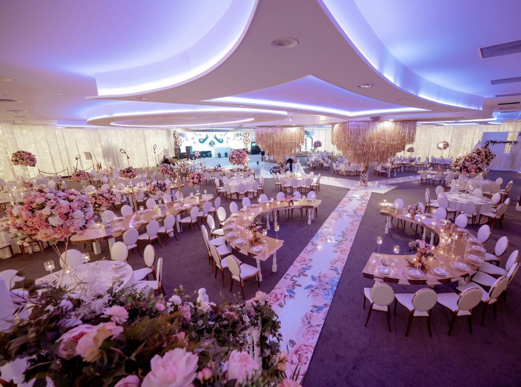 Elegant Banqueting Suite with floral decor, perfect for weddings and upscale events.
