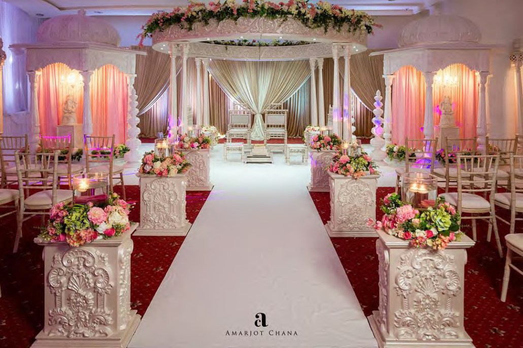 Elegant Banqueting Suite with floral decor, perfect for weddings and formal ceremonies.