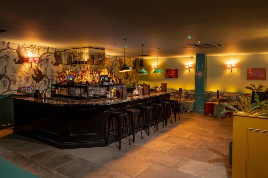 Stylish bar area in Signing Tree Venue for networking events and gatherings.