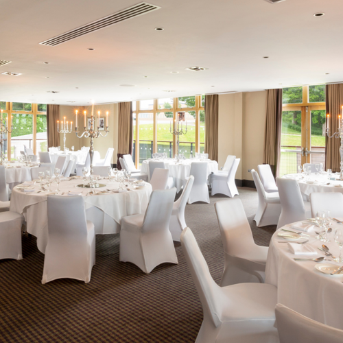 Repton Lounge at Oulton Hall, elegant dinner setup for weddings and corporate events.