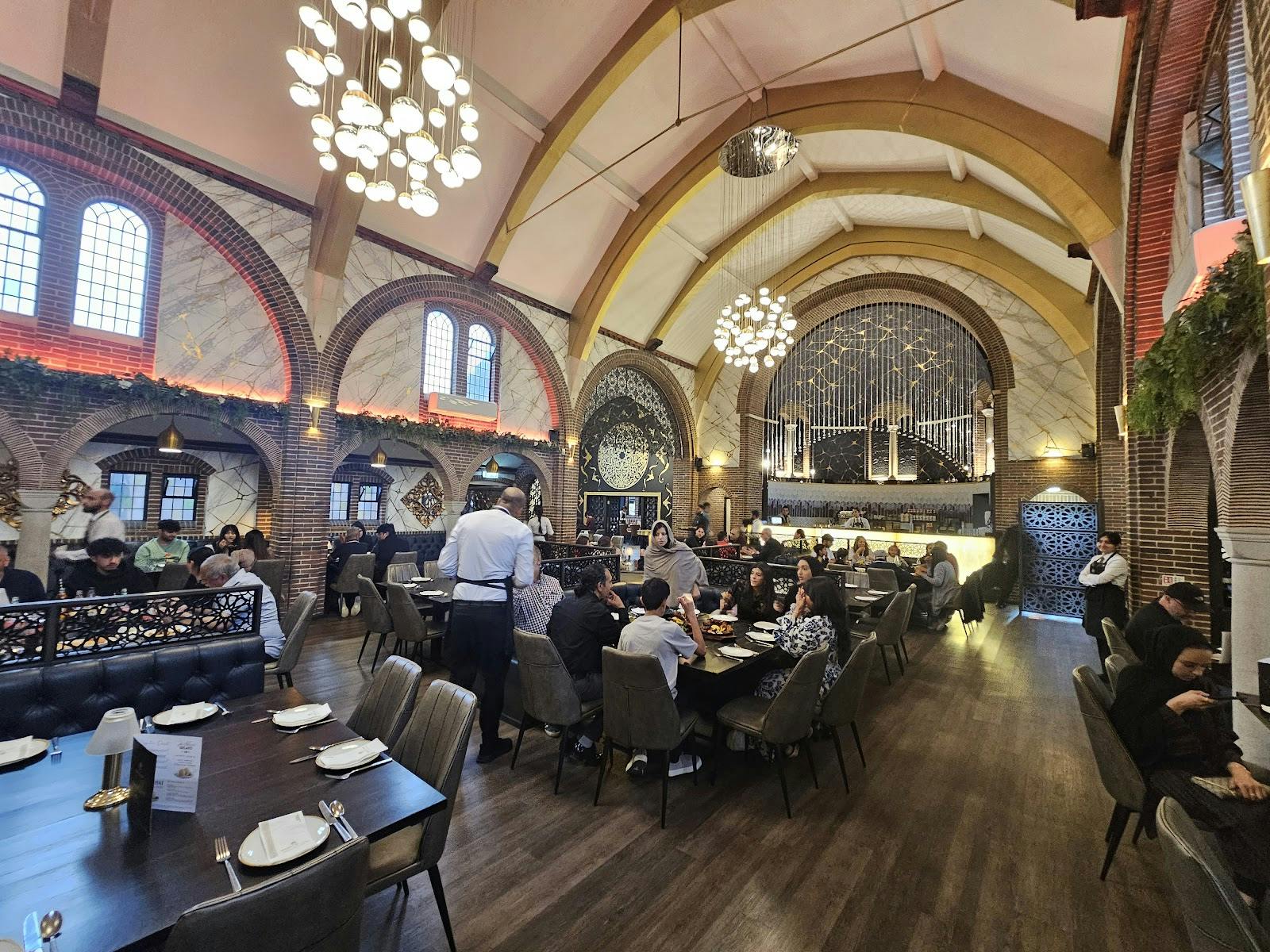 Vibrant Mughal-e-Azam Banqueting reception room for events, featuring stylish decor and spacious layout.