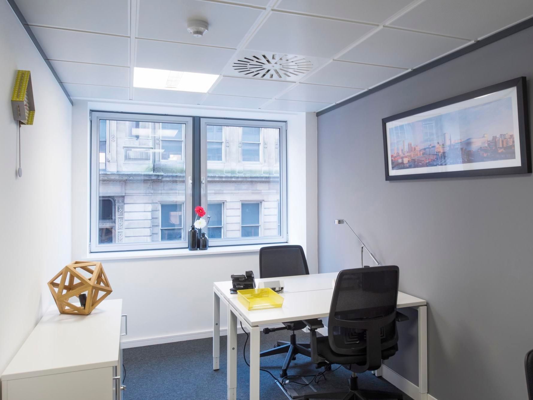 Modern meeting room at Edmund House, Birmingham with natural light for productive sessions.
