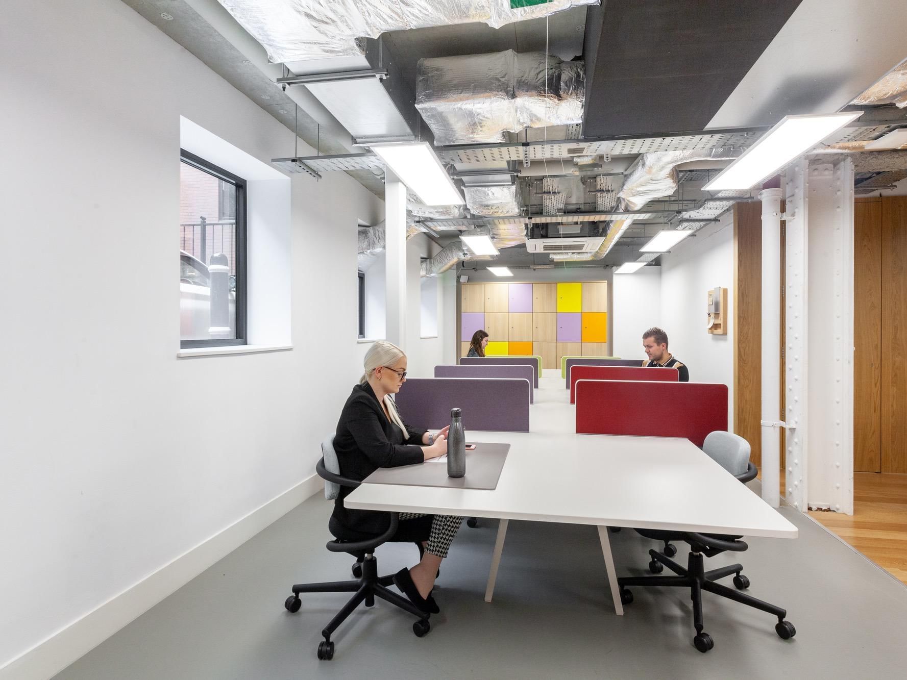 Modern cafe workspace in Lewis Building, ideal for meetings and collaboration.