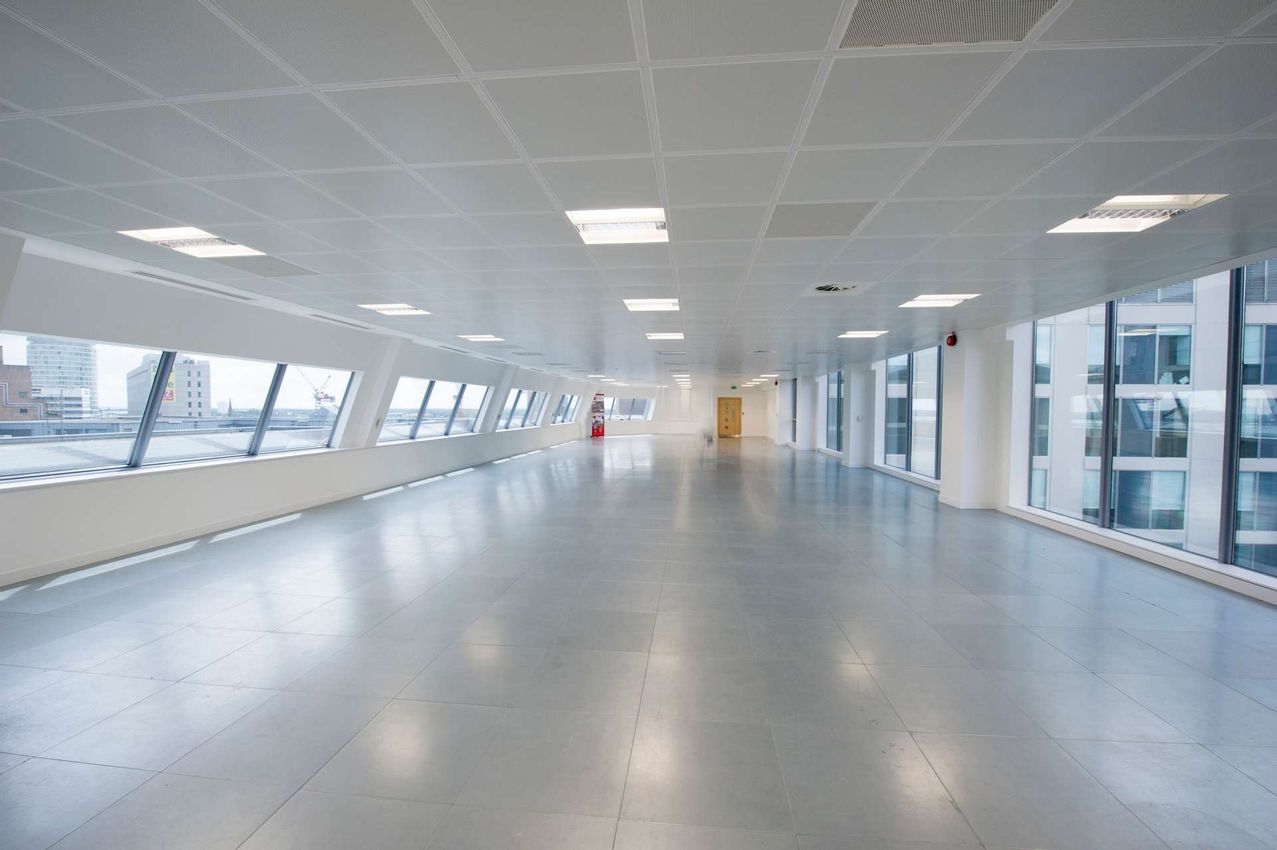 Spacious modern meeting room with large windows at 1 Victoria Square for events.