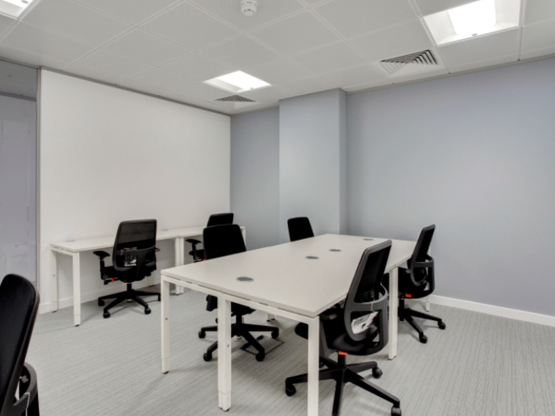 Modern minimalist meeting room in Apex House, ideal for collaborative events and presentations.