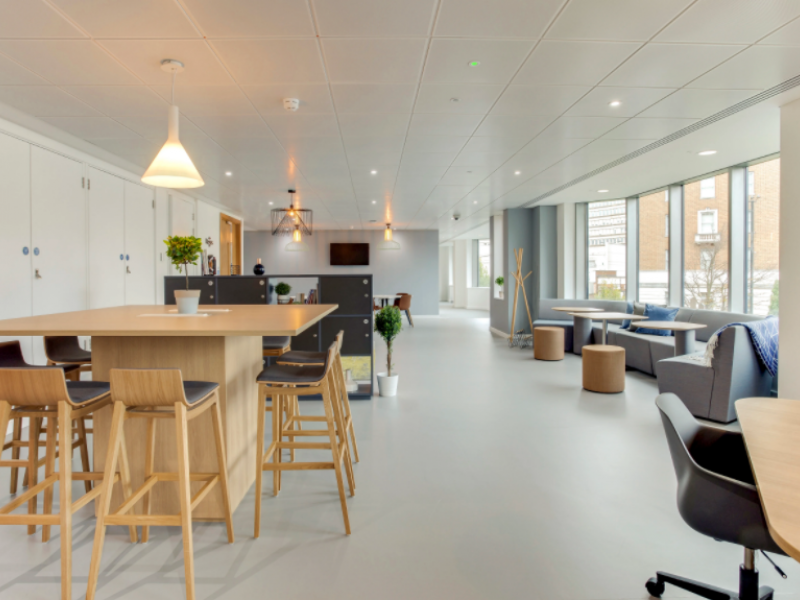 Modern meeting room in Apex House with natural light, ideal for workshops and gatherings.