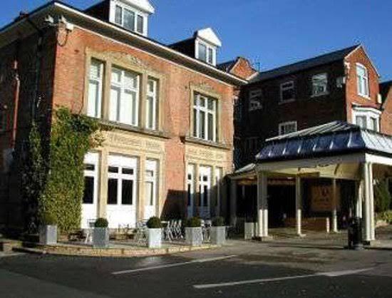 Charming Hotel in The Yenton with inviting entrance, perfect for events and meetings.