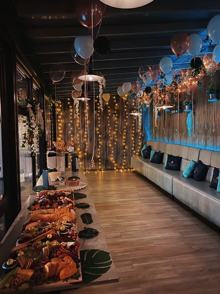 Elegant function room at Brick & Beam with cozy seating for intimate events.