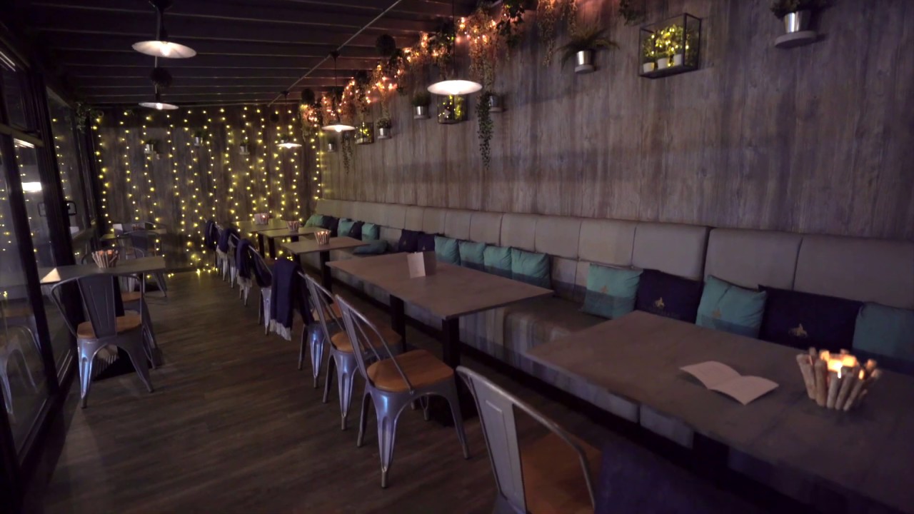 Stylish function room with cozy seating for intimate gatherings and networking events.