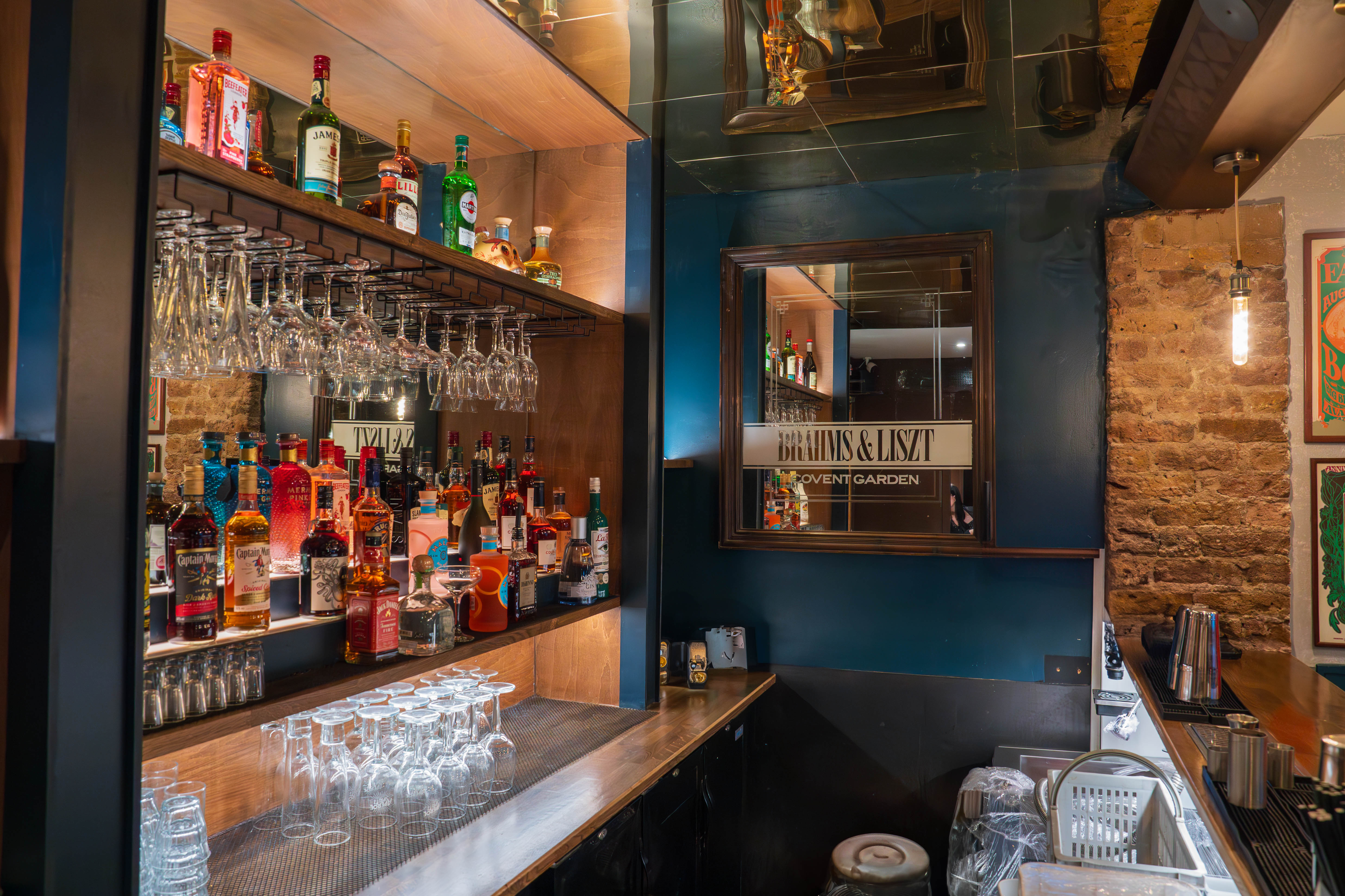 Studio bar at Maxwell's Bar and Grill, showcasing elegant glassware for events.