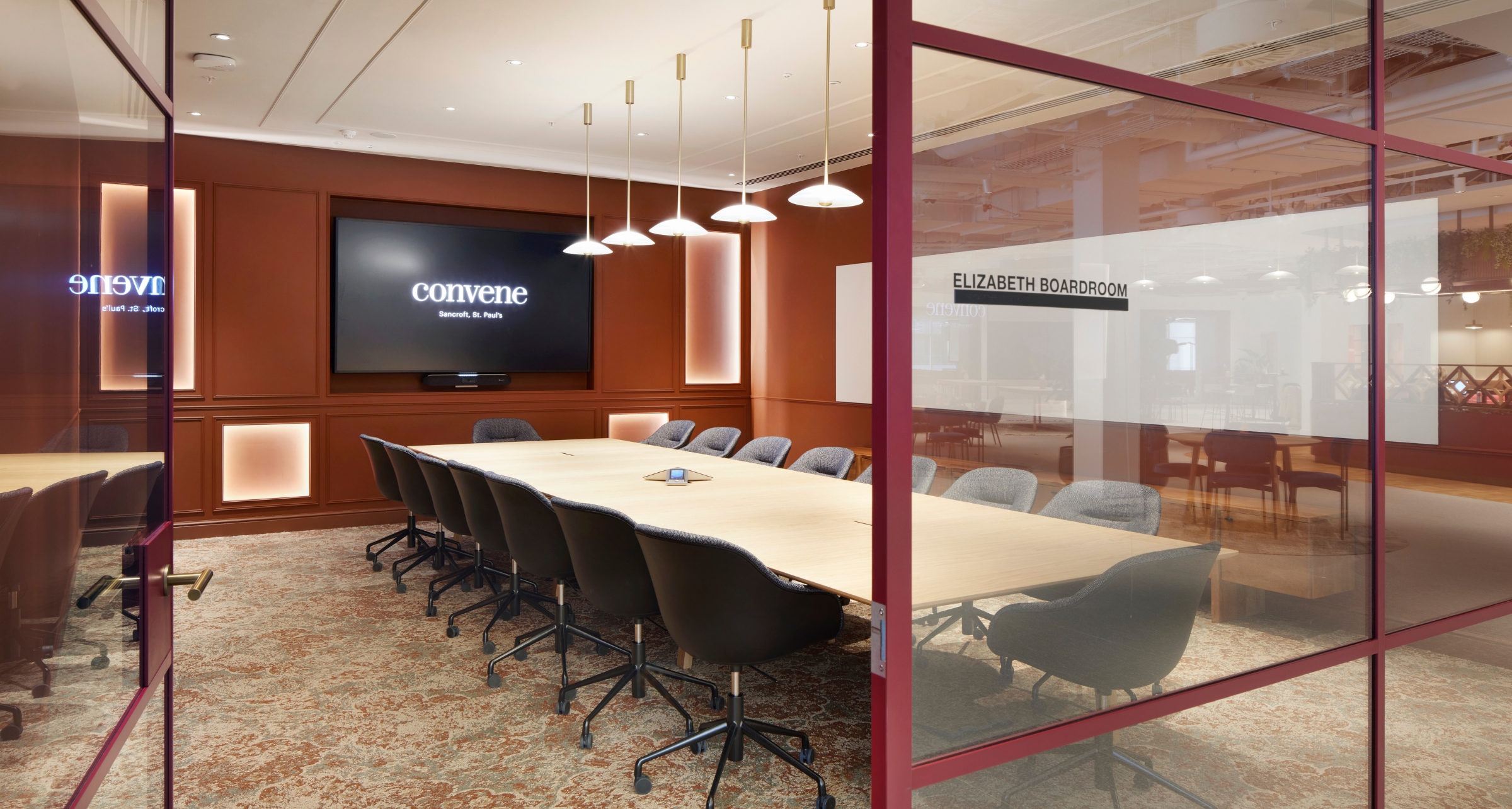 Modern conference room with oval table for corporate events at Convene Sancroft, St Pauls.