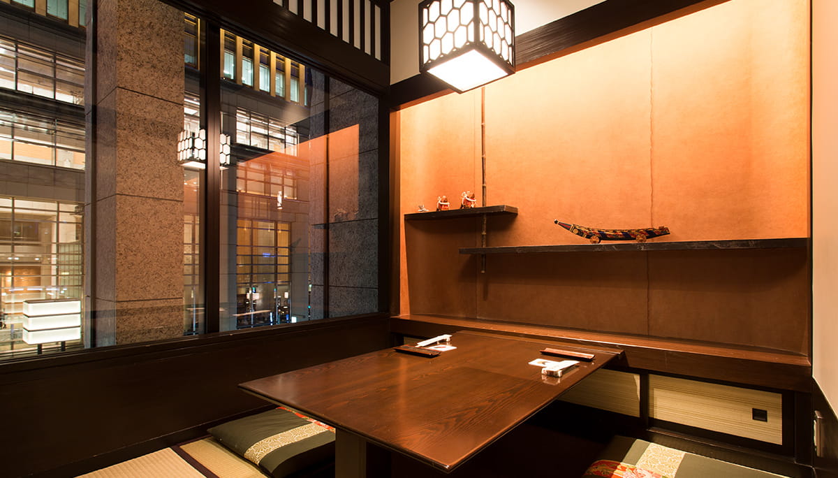 Cozy private meeting room with wooden accents for intimate events in Nihombashi.