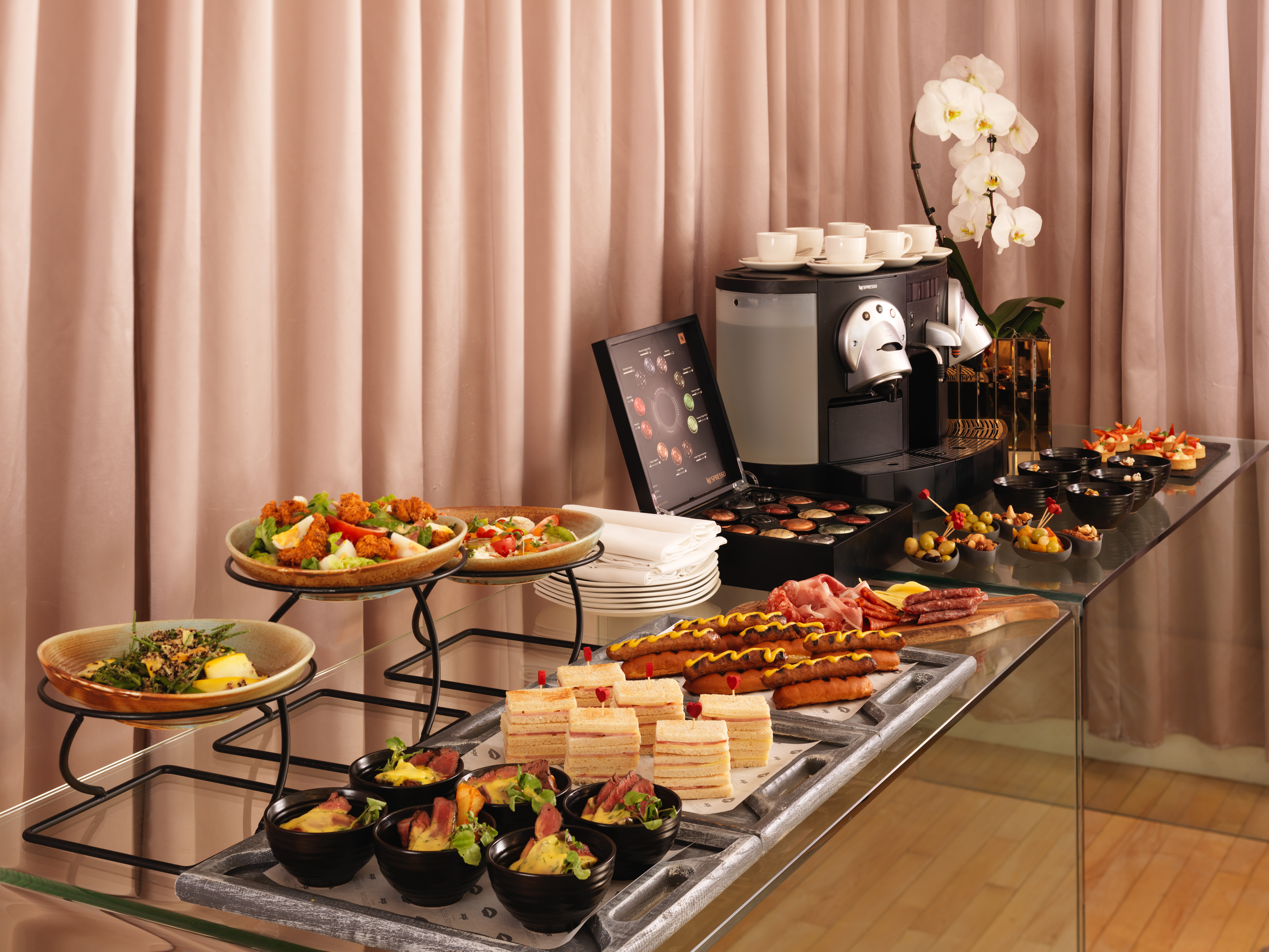 Boardroom catering setup in Sanderson London for corporate events and networking.
