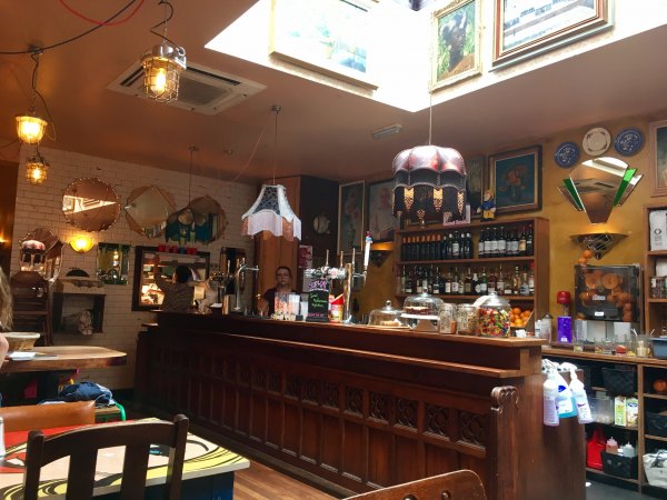 Cozy Arco Lounge venue with warm lighting, ideal for intimate gatherings and casual meetings.