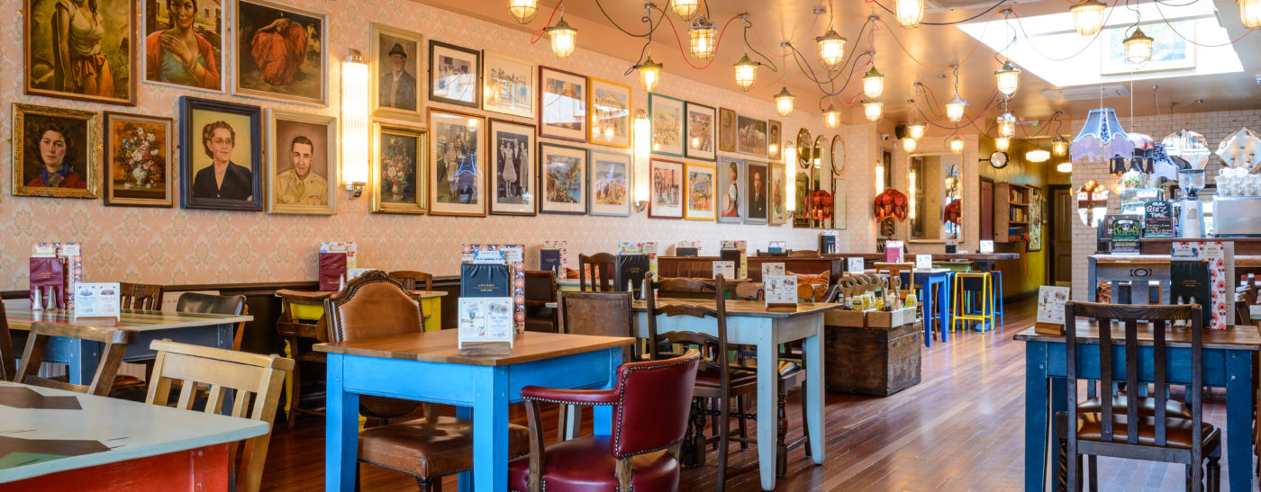 Vibrant Arco Lounge dining space with colorful decor for casual meetings and events.