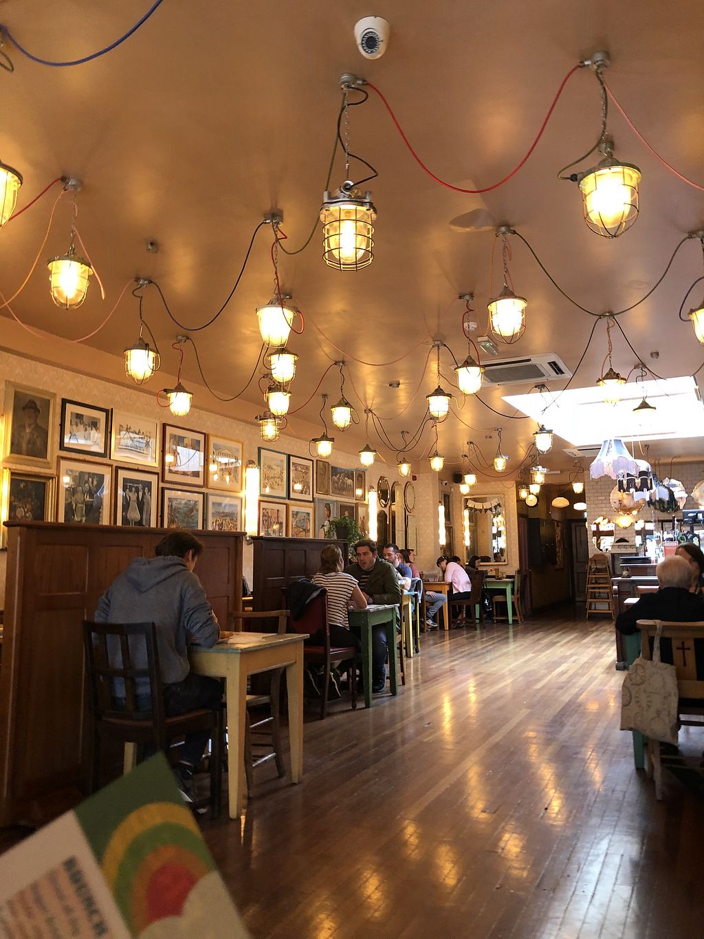 Cozy Arco Lounge venue with warm ambiance, ideal for gatherings and meetings.