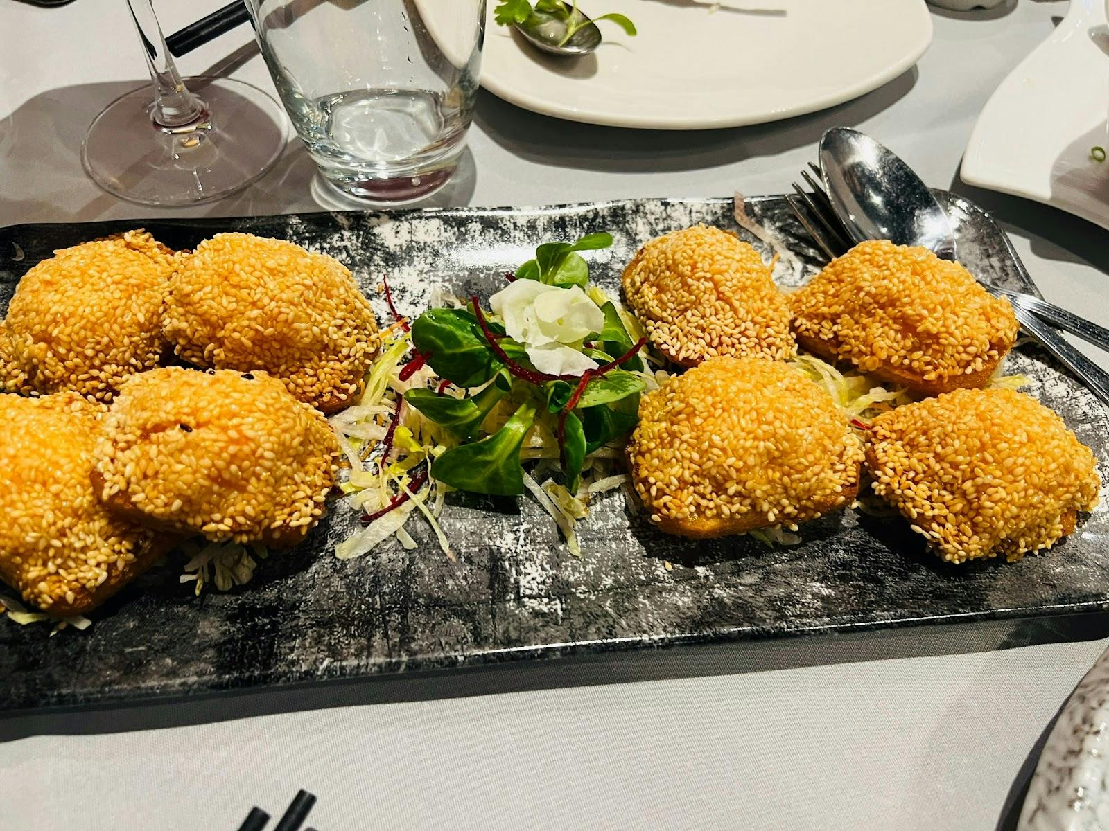 Private dining suite with elegant breaded appetizers for networking receptions and formal dinners.