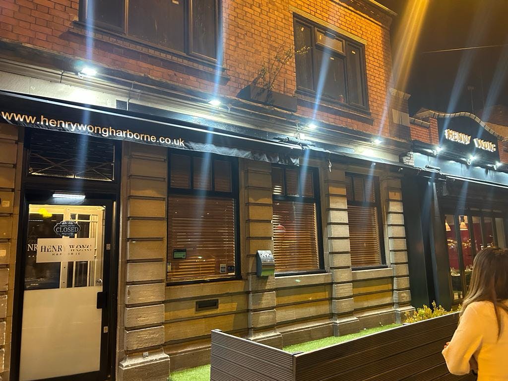 Private dining suite exterior at Henry Wong, ideal for evening events and gatherings.