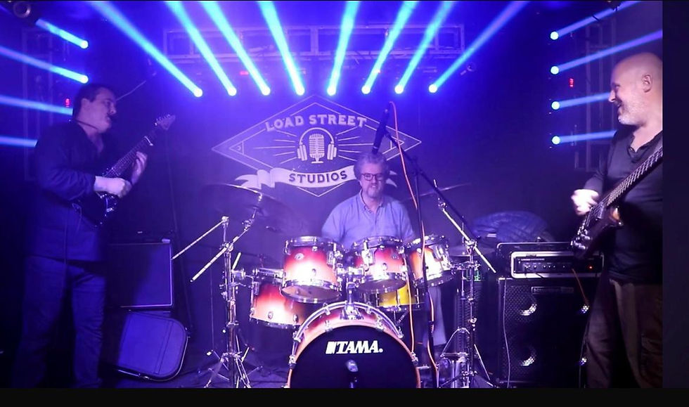 Vibrant live music performance in a professional recording studio venue.