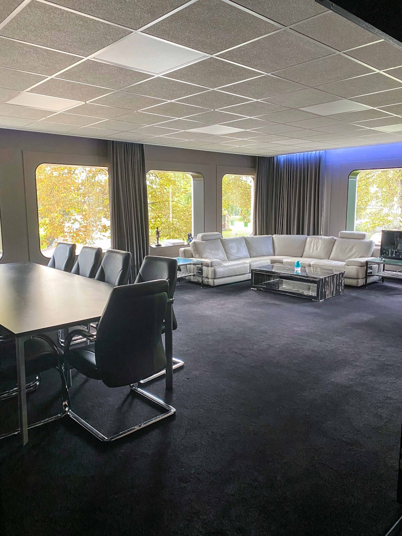 Modern Hive Meeting Room with sleek table, ideal for workshops and executive meetings.