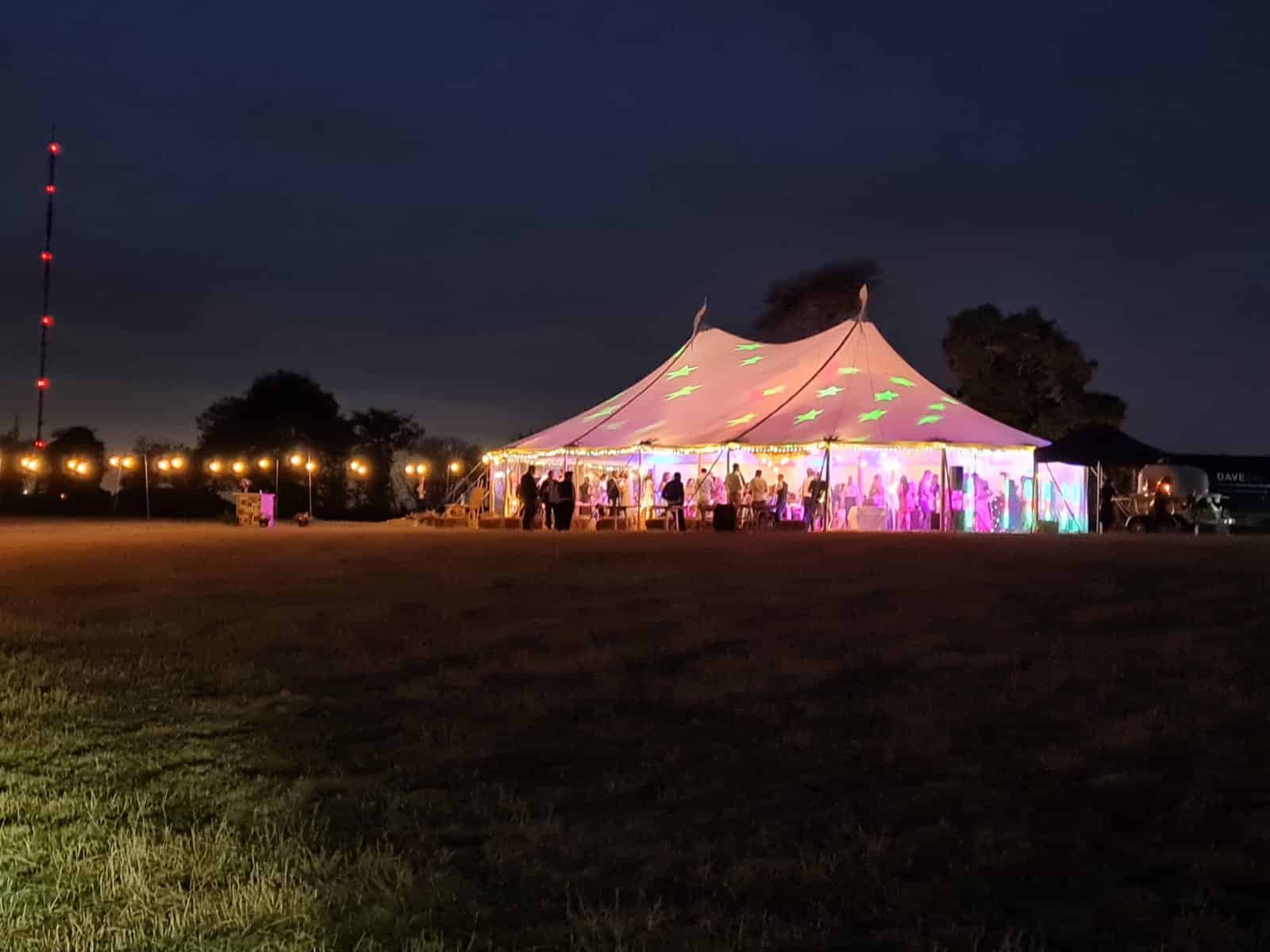 Illuminated tent at The Venue at Little Hay for elegant weddings and events.