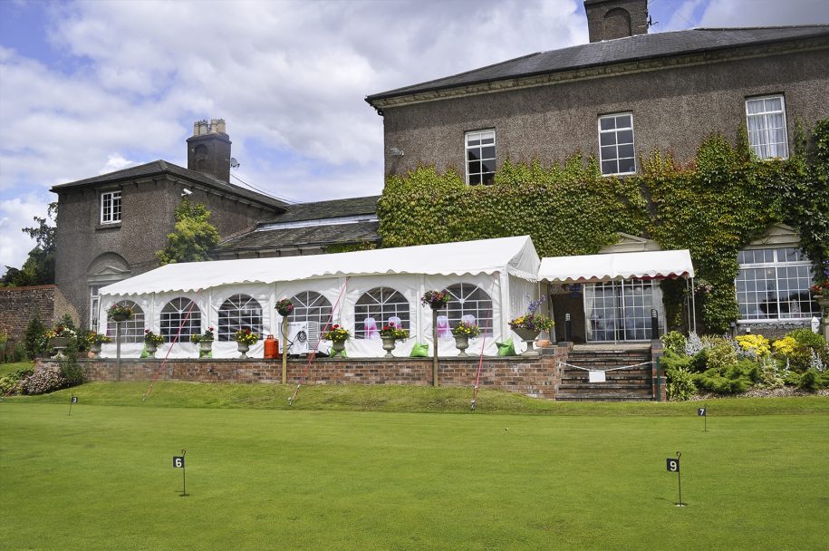Halesowen Golf Club marquee venue for weddings and corporate events, featuring floral decor.
