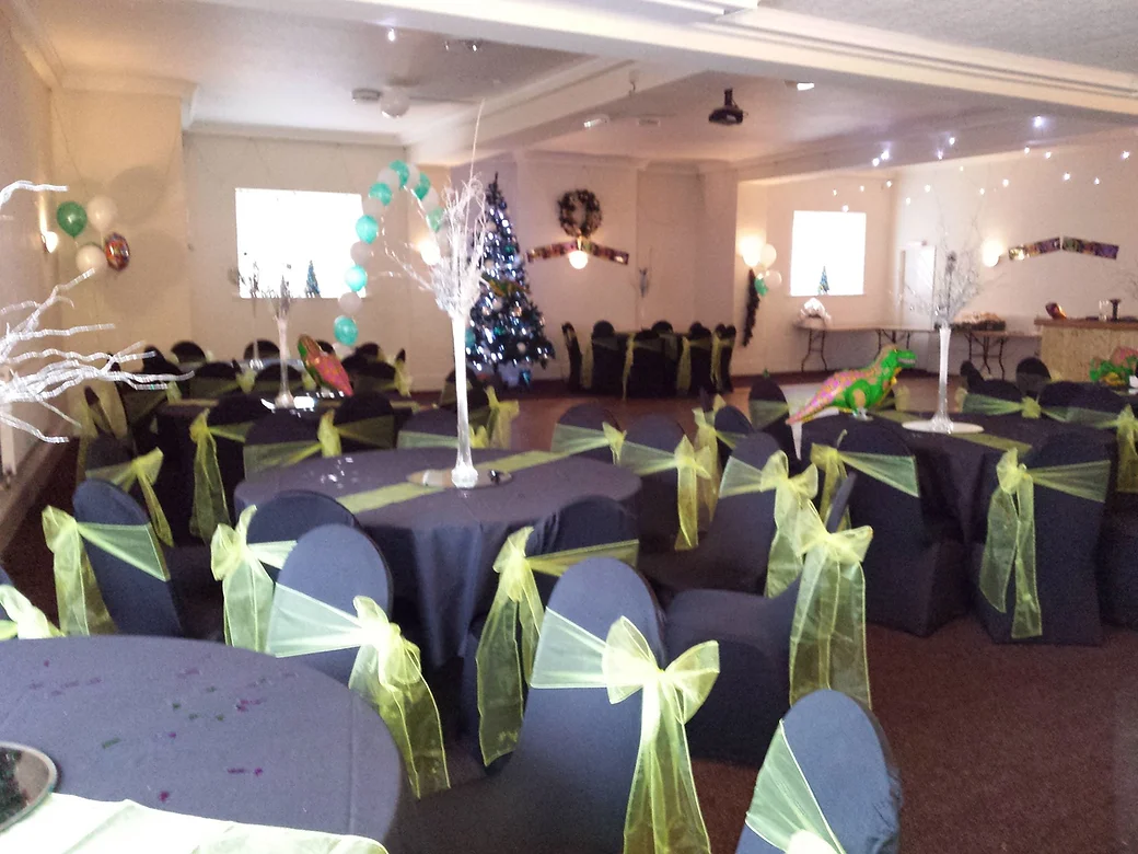 Function room at Hall Green Stadium with festive decor for holiday parties and events.