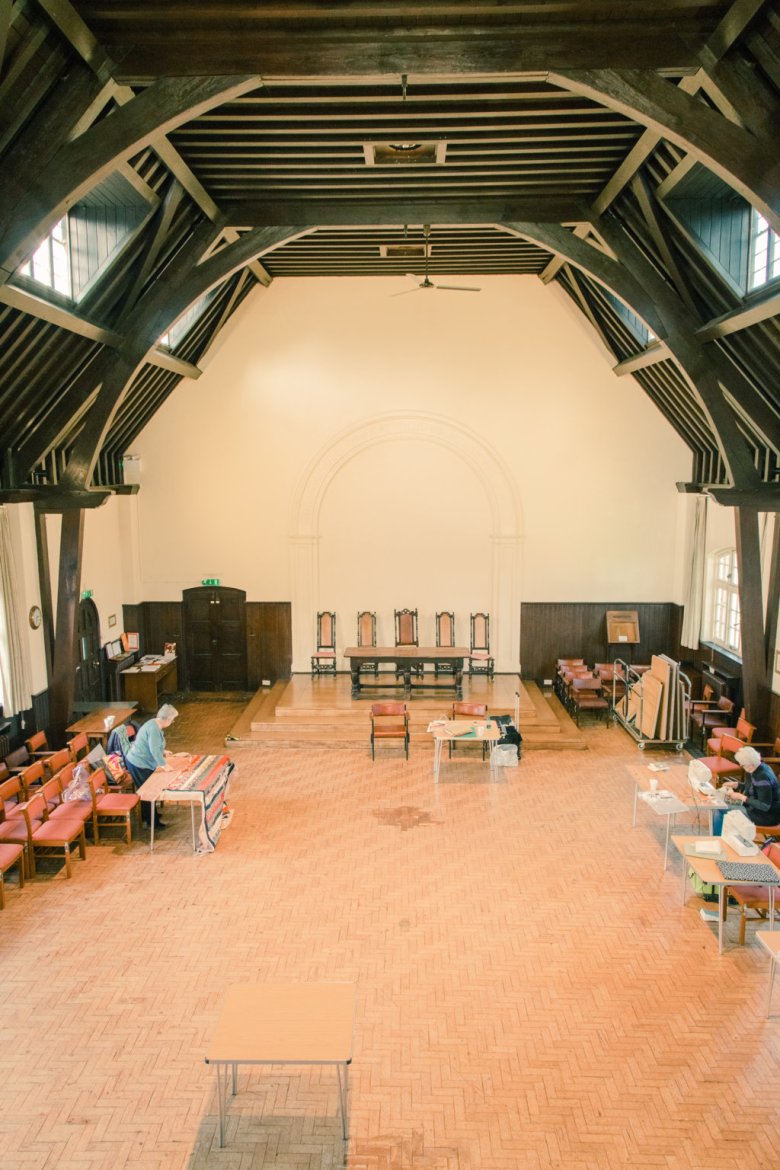 Quaker church meeting room with high ceilings, ideal for workshops and conferences.