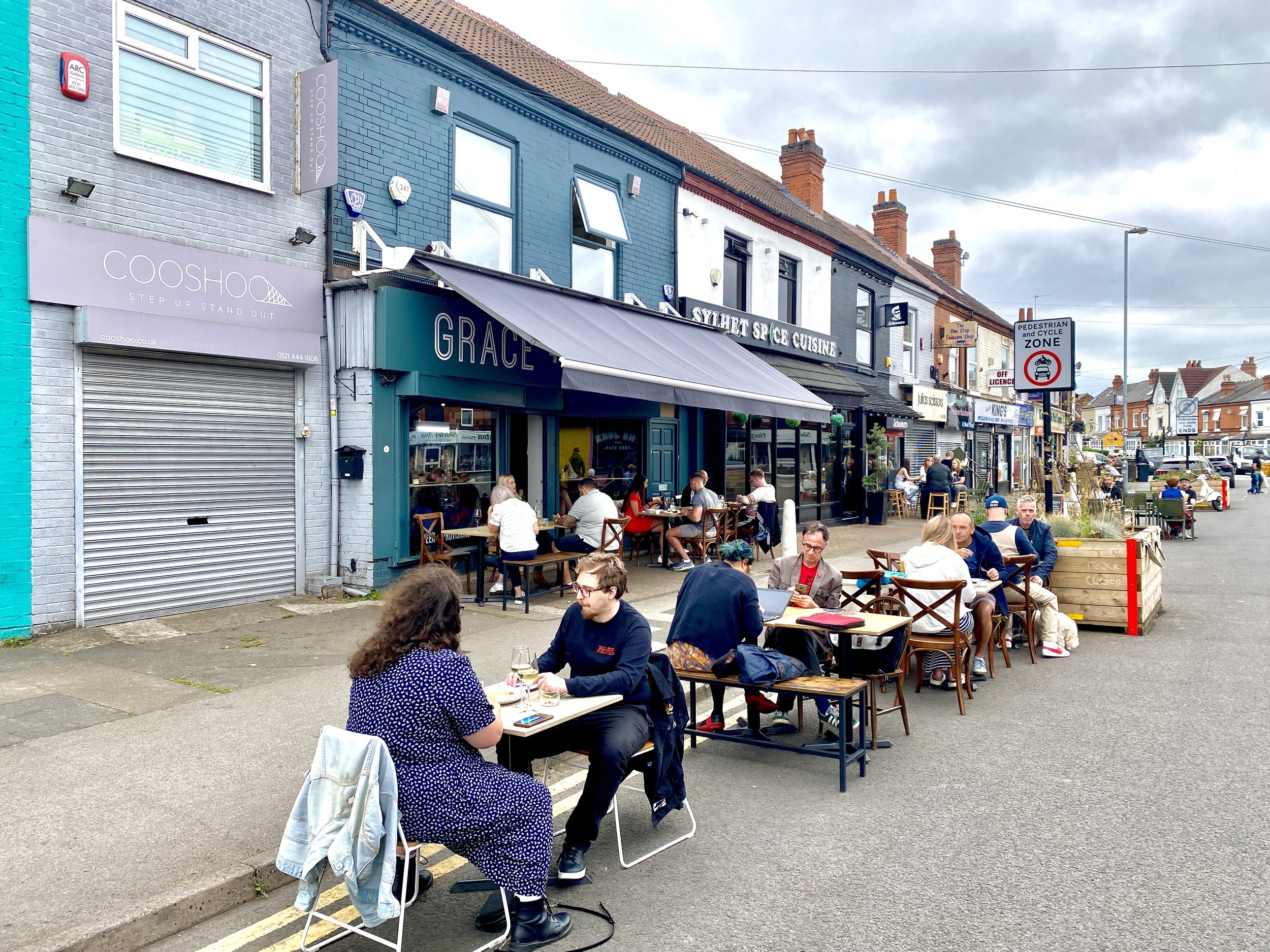 Vibrant outdoor dining at Upstairs Kings Heath, ideal for casual networking events.