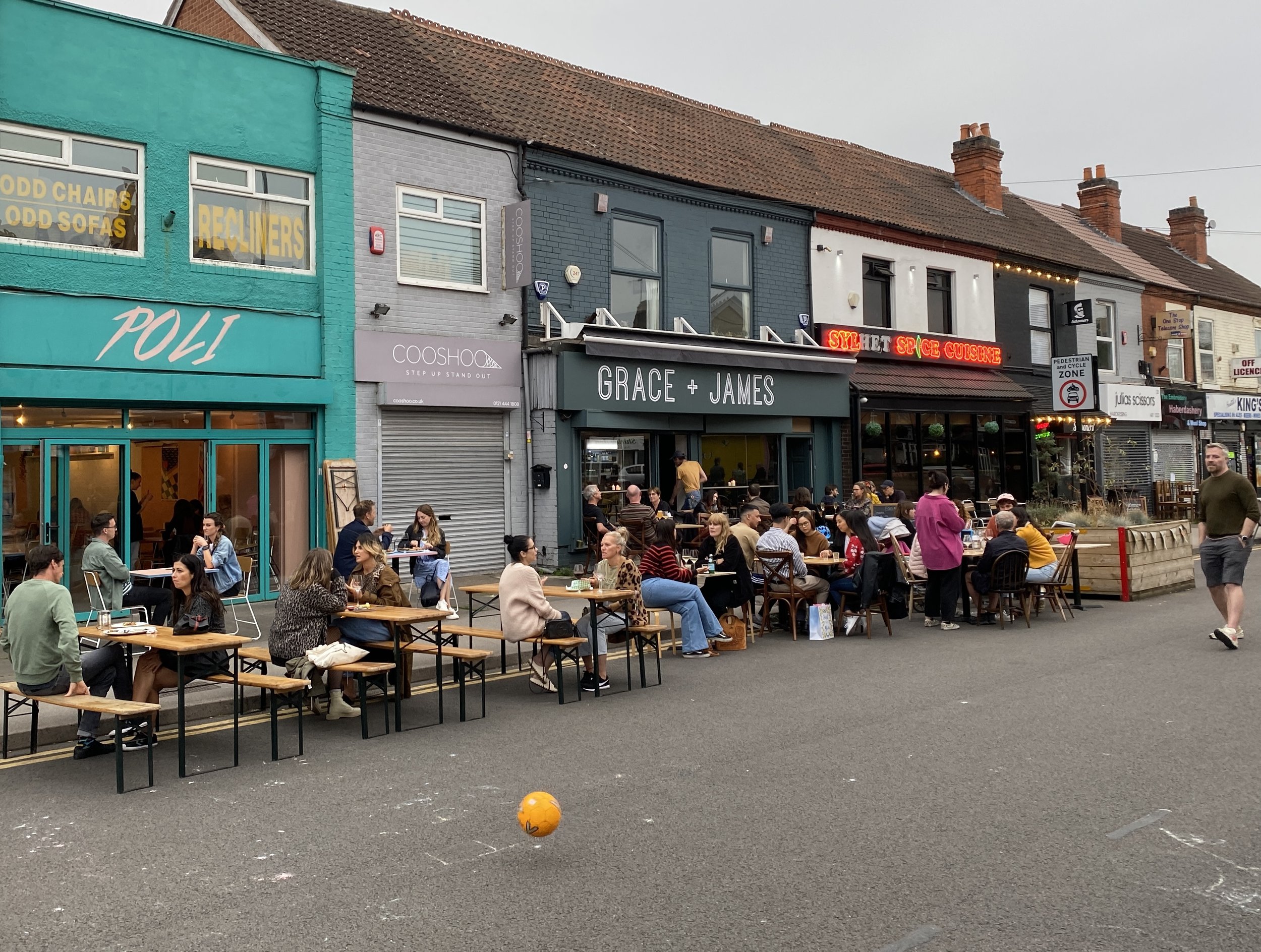 Vibrant outdoor dining at Upstairs Kings Heath, ideal for casual gatherings and events.