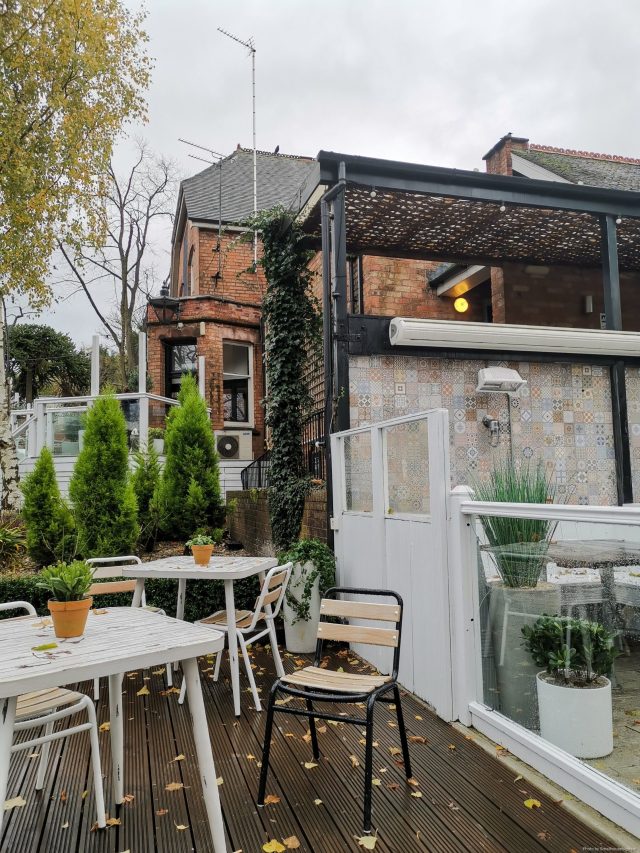 Charming outdoor venue with greenery for networking events and team-building activities.