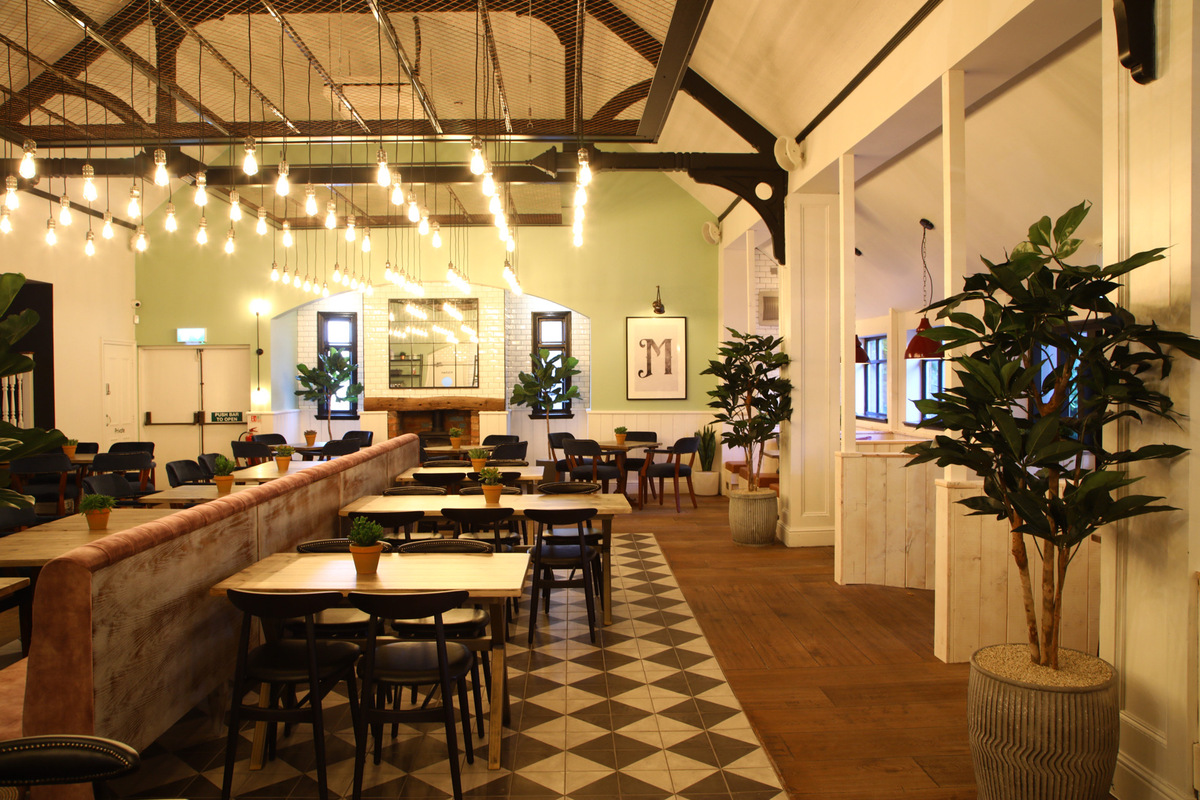 Modern event space with natural light, ideal for networking and receptions.