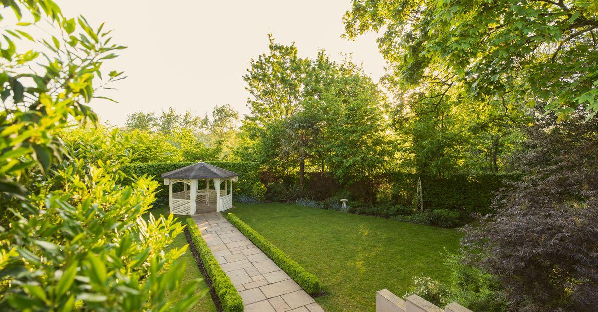Outdoor gazebo in Warwick House garden, perfect for weddings and events.