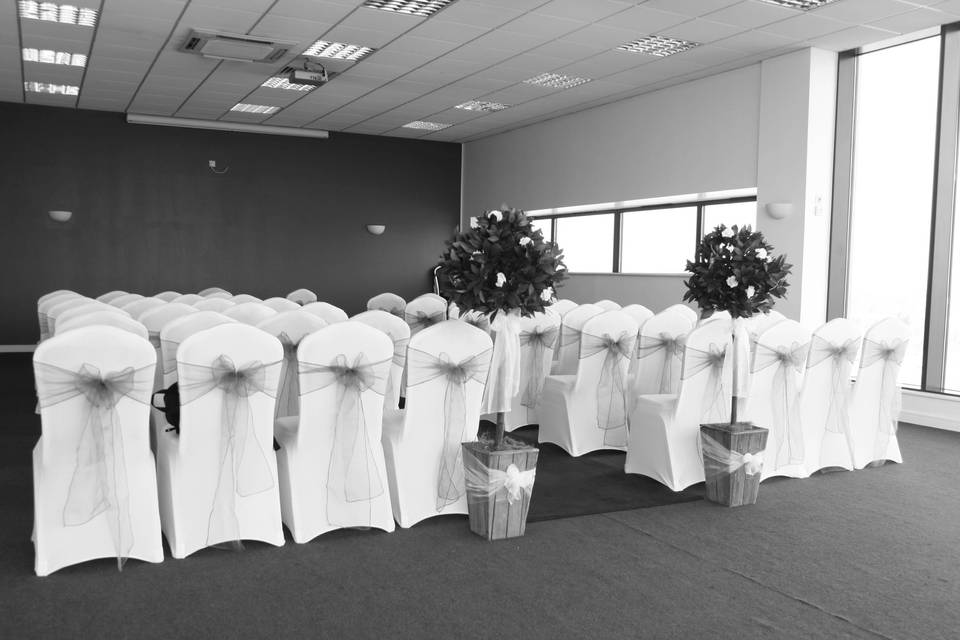 Gala Dinner Hall at Sixways Stadium, elegant chairs for weddings and formal events.