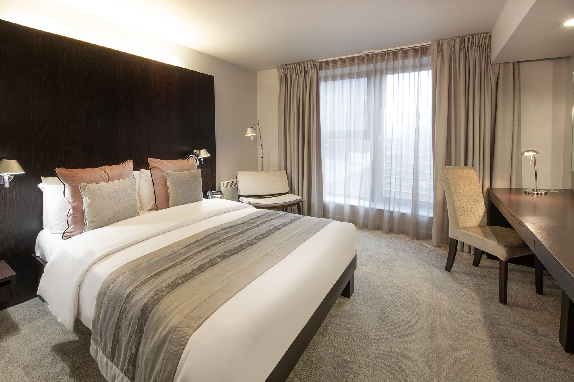 Modern hotel room in Conference Aston, ideal for business travelers at events.