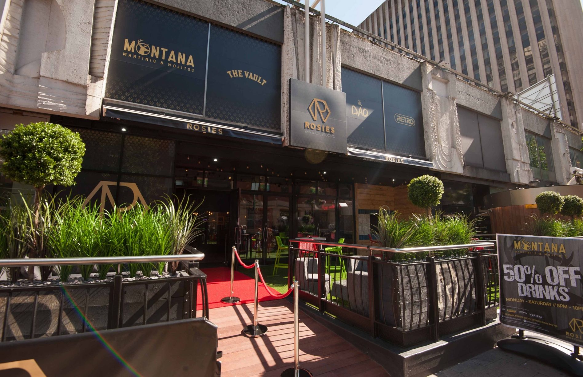 Vibrant R1 venue entrance with red carpet, perfect for events and networking.