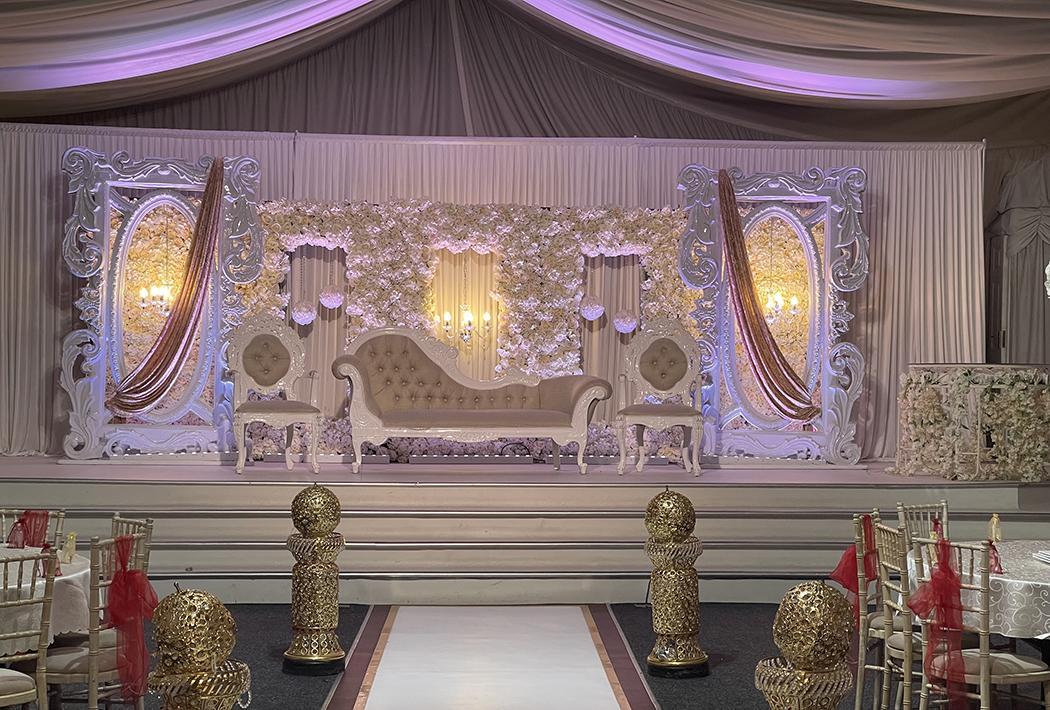 Elegant Banqueting Hall with ornate decor, perfect for weddings and galas.