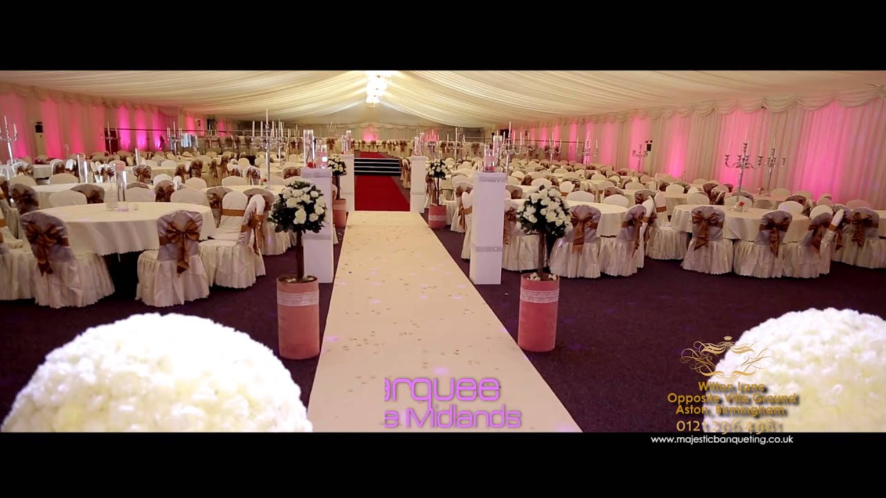 Elegant Banqueting Hall with floral centerpieces for weddings and upscale events.