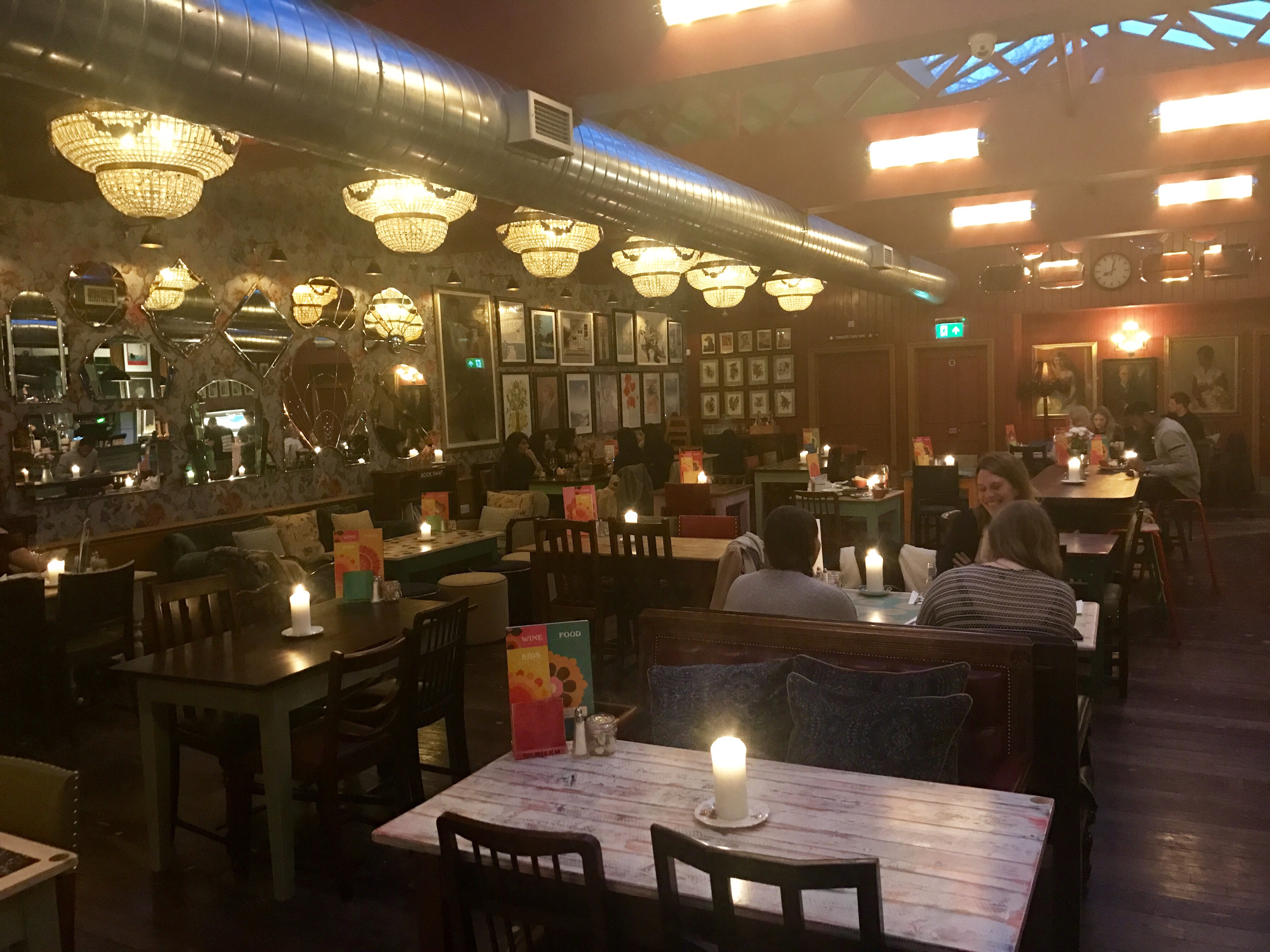 Cozy Sorrento Lounge cafe with warm lighting, ideal for intimate gatherings and meetings.