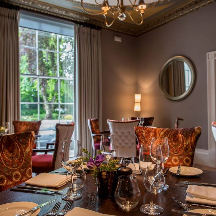 Elegant dining space at Bar in Three Church Road, perfect for upscale events and gatherings.